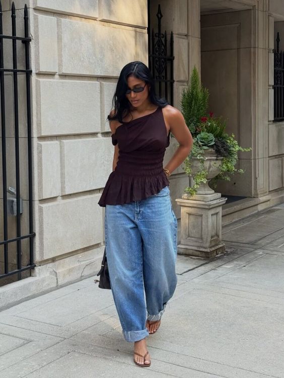 One-Shoulder Brown Top and Light Barrel Jeans Concert Outfit