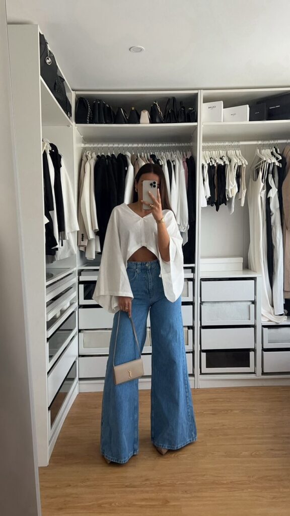Flowing White Top with Wide-Leg Jeans Party Look