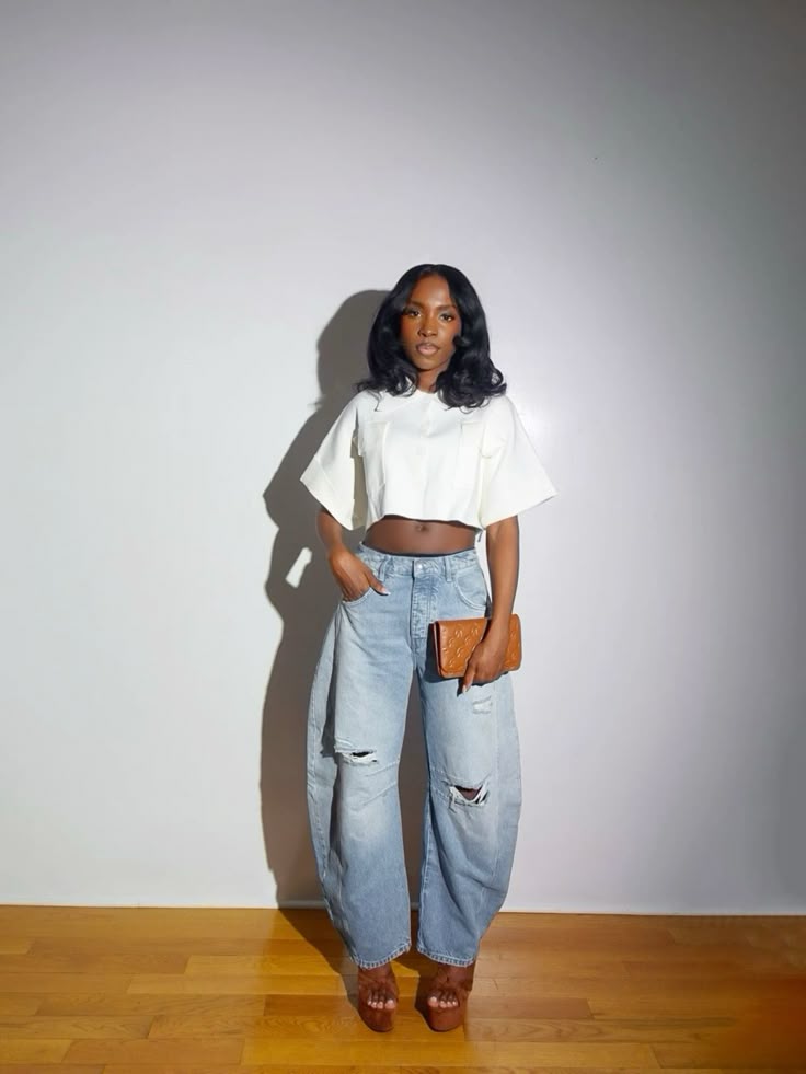 Cropped White Top and Distressed Barrel Jeans Concert Outfit