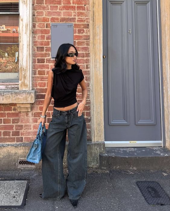 Sleek Black Top with Dark Baggy Jeans Dinner Outfit