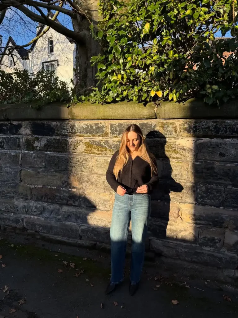 Black Top with Two-Tone Barrel Jeans for Dinner