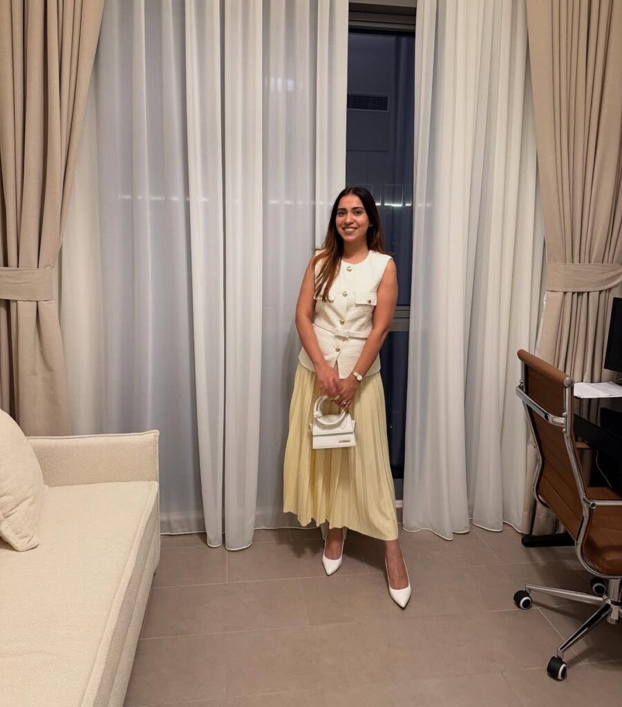 Cream Waistcoat with Yellow Pleated Skirt Office Outfit