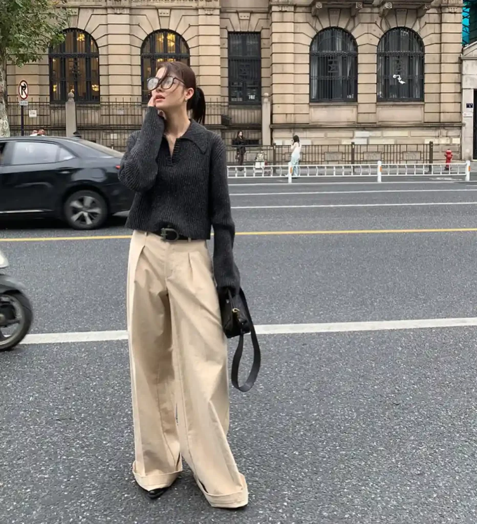 Dark Knit Sweater with Wide Khaki Pants Office Outfit