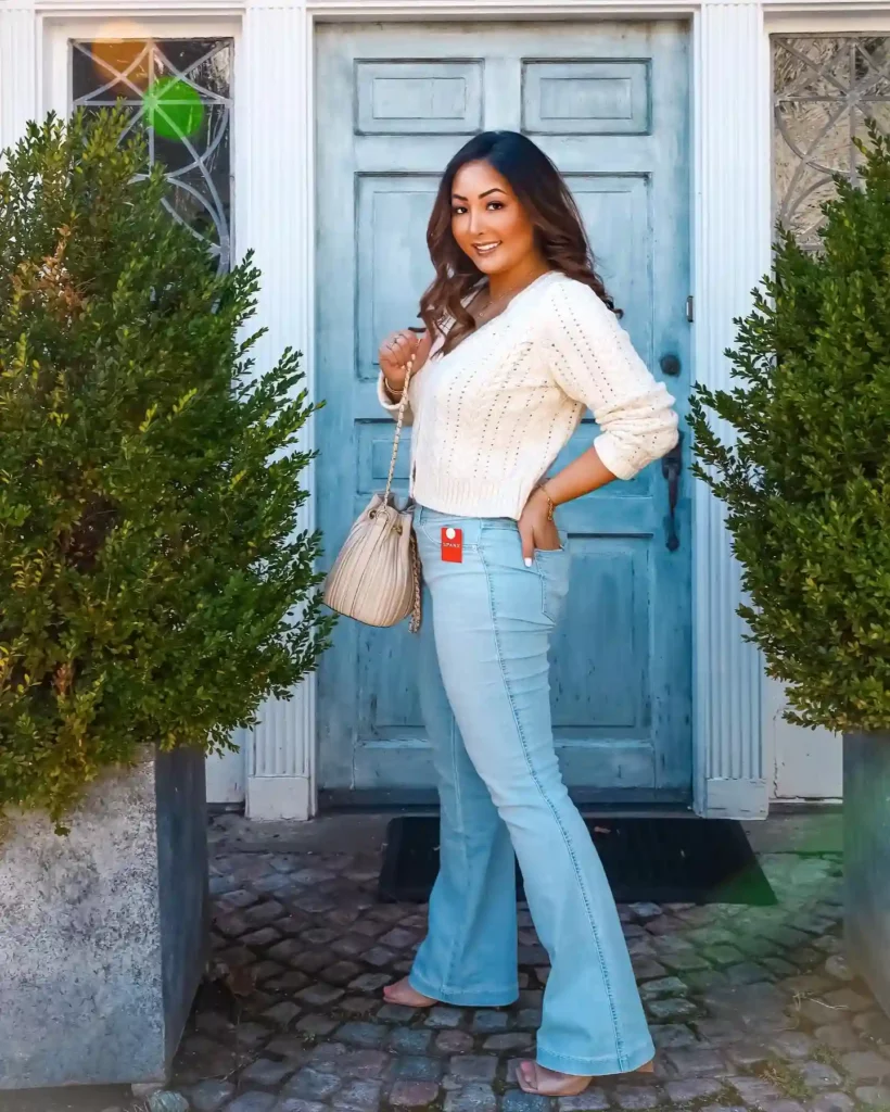 Cream Knit Sweater with Light Flare Jeans Office Outfit