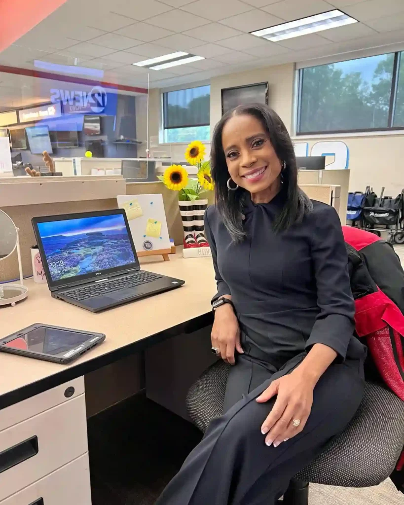 Sleek All-Black Office Look with Tailored Pants