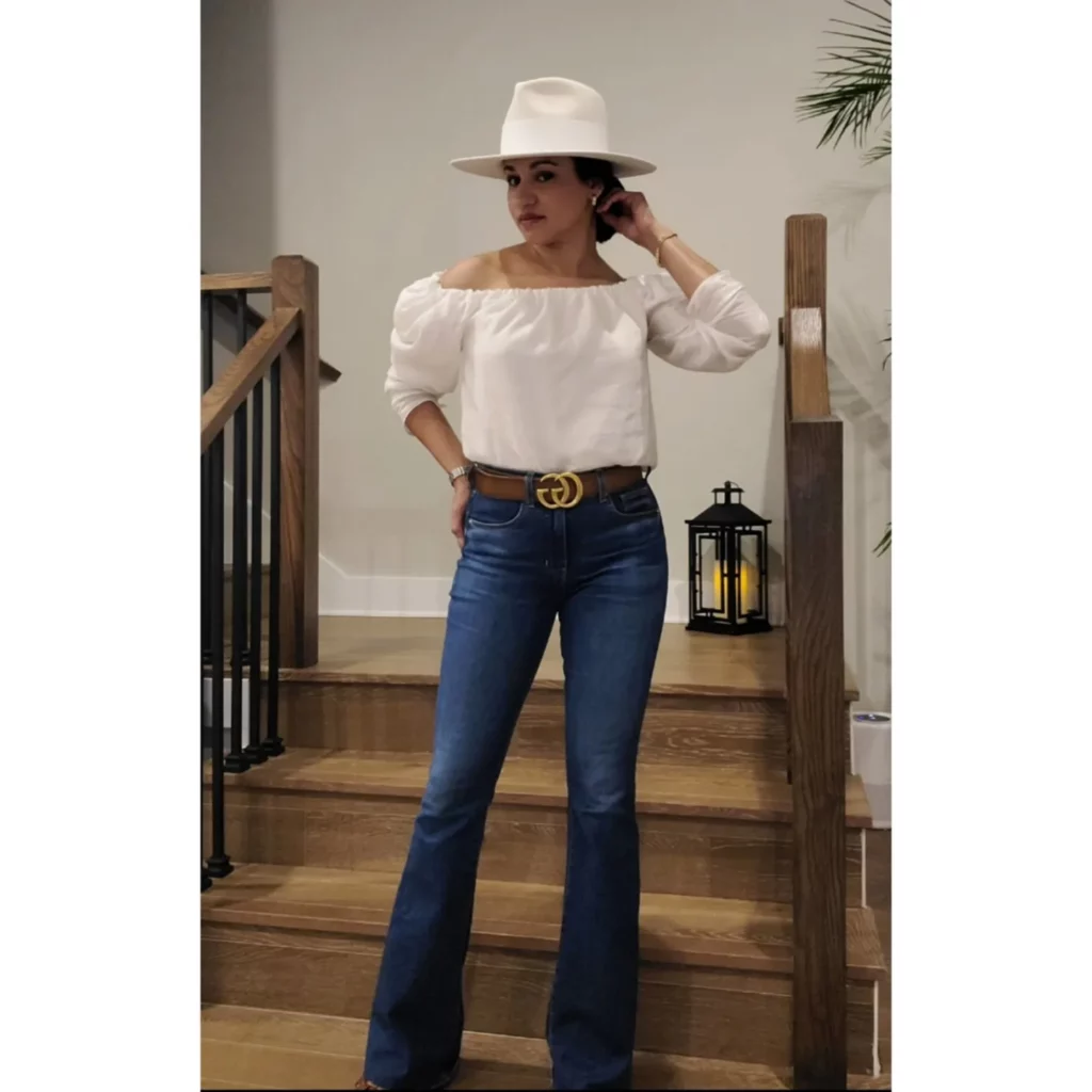 Off-Shoulder White Top with Flared Jeans Office Outfit