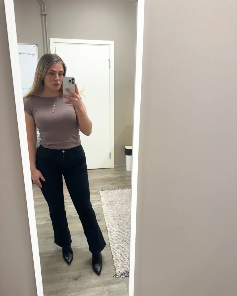 Fitted Neutral Top with Black Jeans Office Outfit