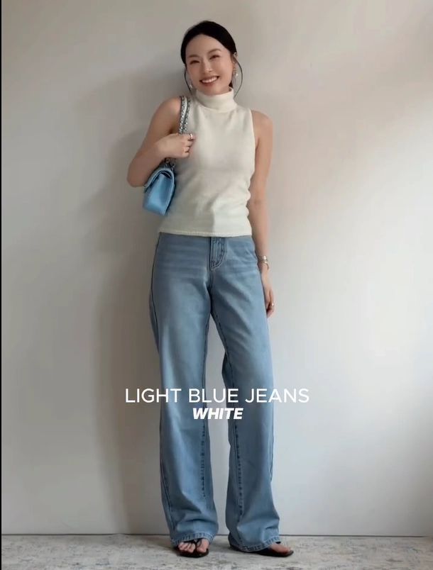 White Sleeveless Top with Light Blue Jeans Office Outfit