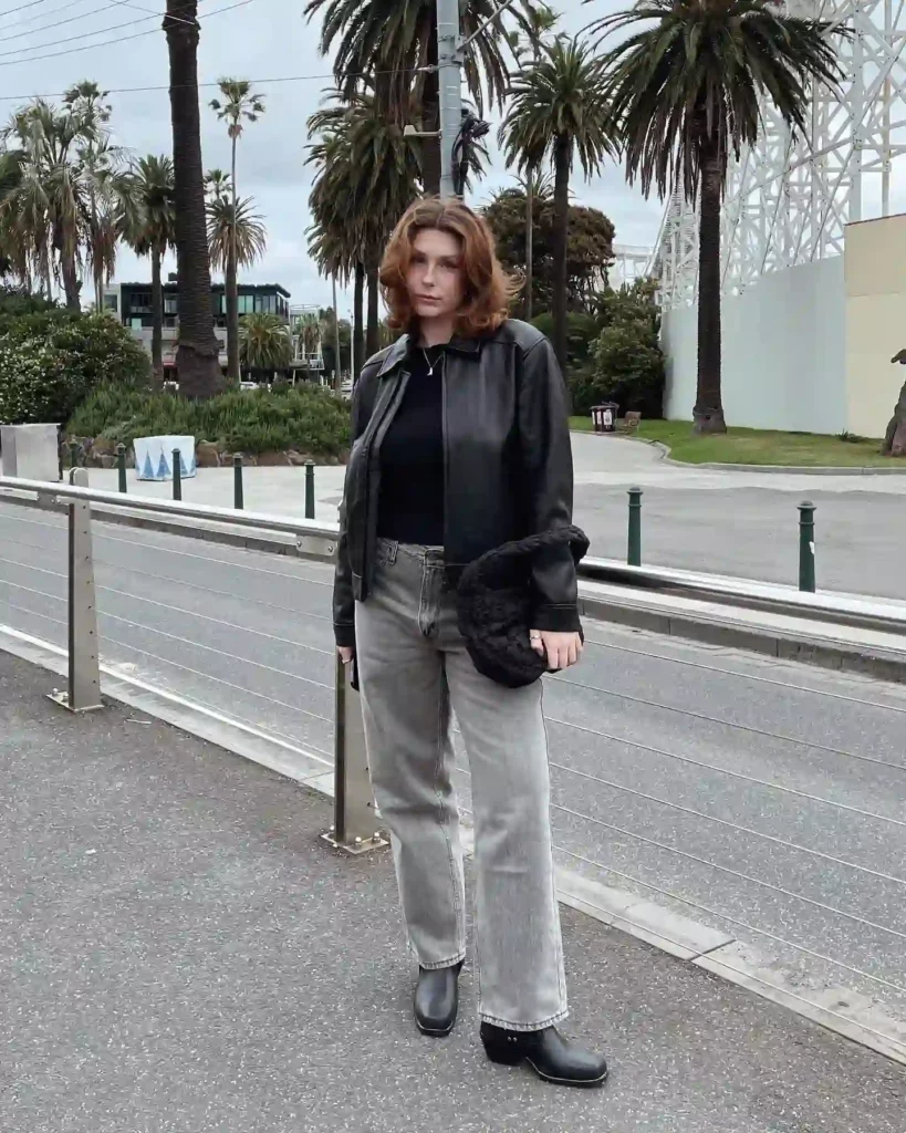 Black Leather Jacket with Grey Straight-Leg Jeans Office Outfit