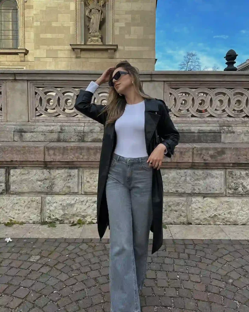 Black Leather Coat with Grey Wide-Leg Jeans Office Outfit