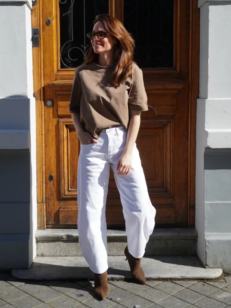 Brown Tee with White Barrel Jeans and Suede Boots Outfit