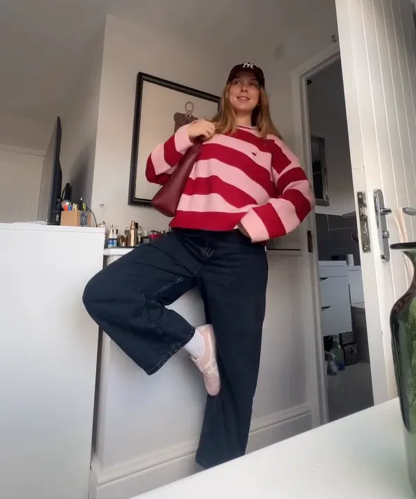 Black Barrel Jeans with Red and Pink Striped Sweater Outfit