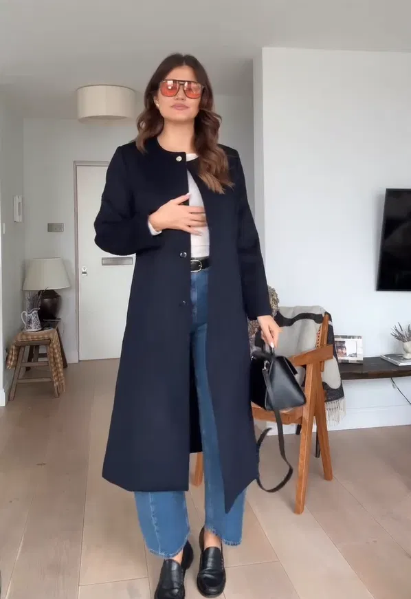 Black Longline Coat over White Top with Blue Barrel Jeans Chic Outfit