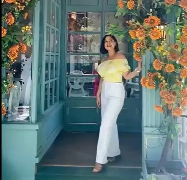 Yellow Off-Shoulder Top with High-Waisted White Jeans