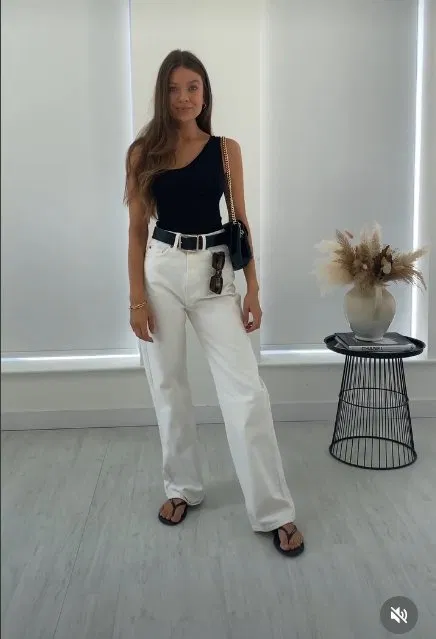 One-Shoulder Black Top with Straight-Leg White Jeans