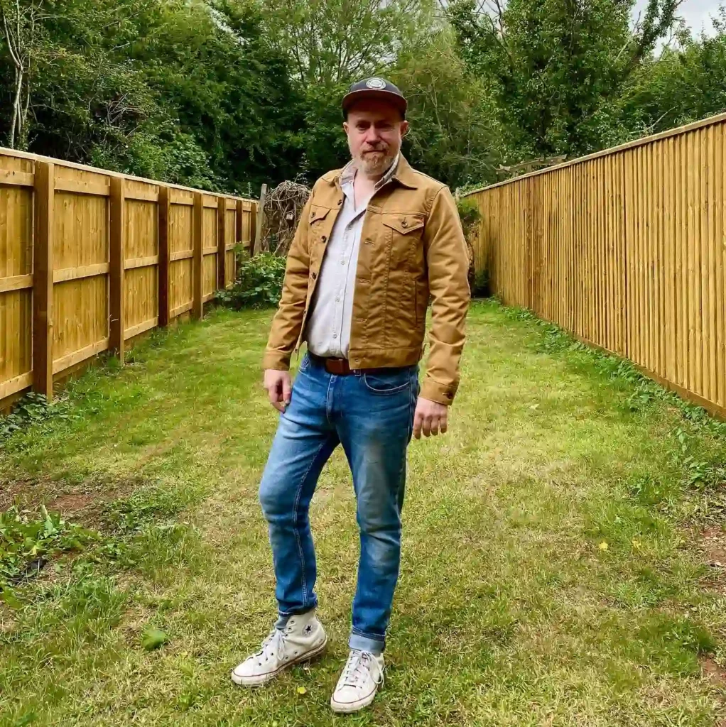 Tan Trucker Jacket with Blue Jeans