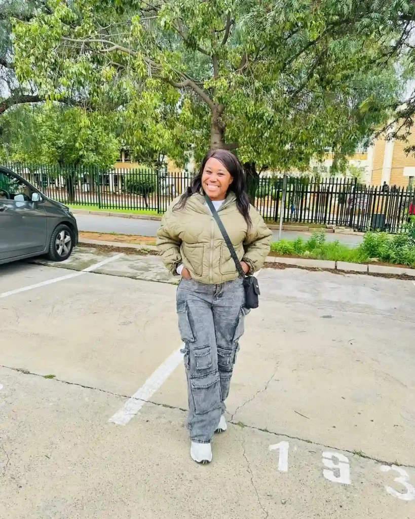 Olive Quilted Bomber Jacket with Gray Cargo Jeans Fall Outfit