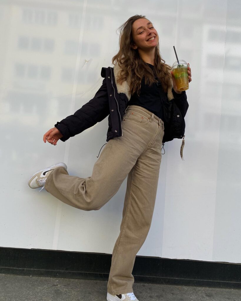 Black Sherpa-Lined Puffer with Tan Brown Jeans Fall Outfit
